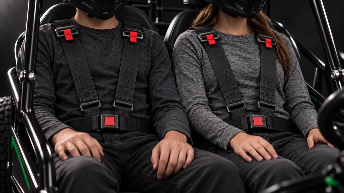 Rider buckled in with a 3-point safety harness