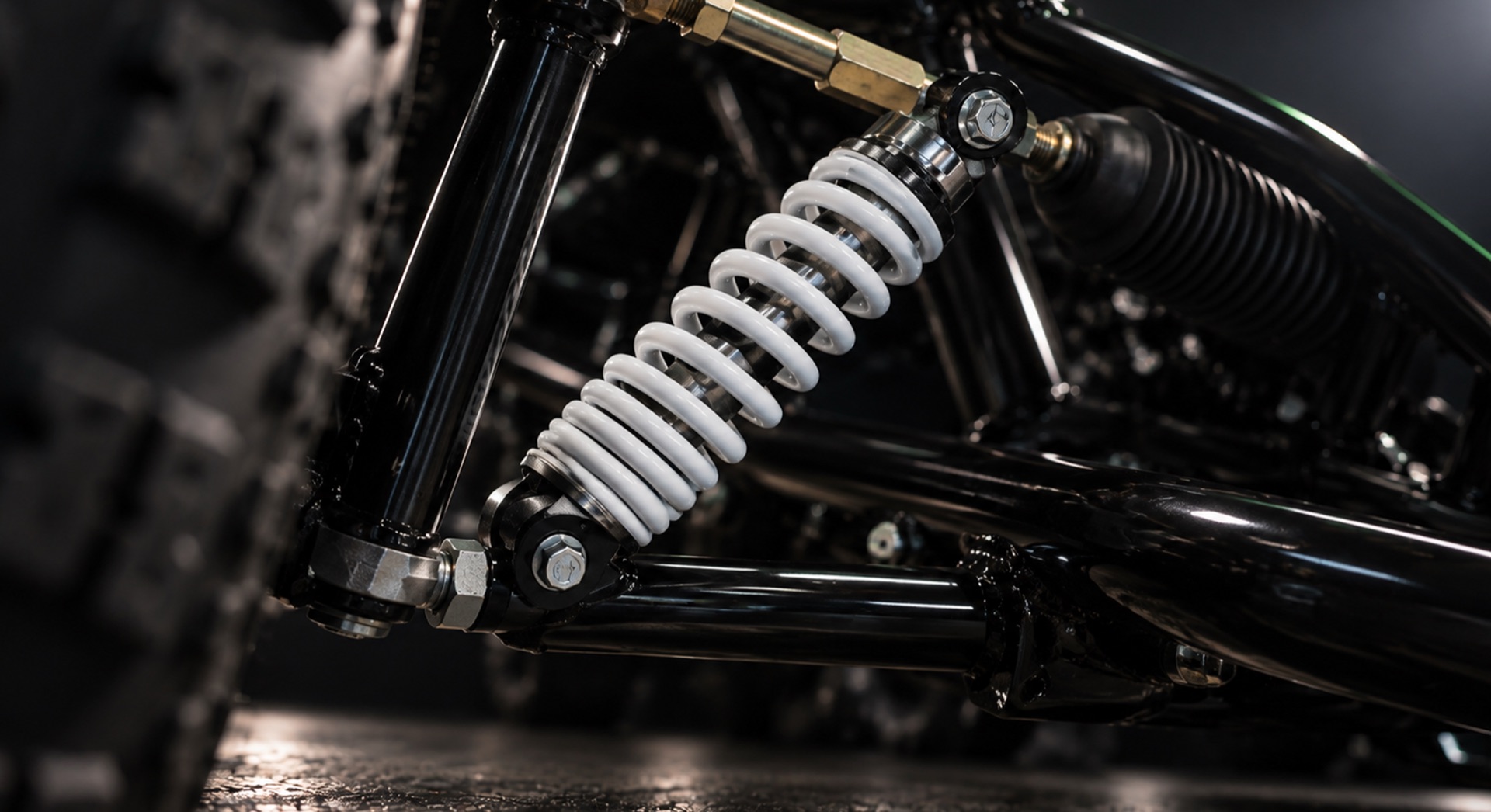 Close-up of the front coil-over shock absorber